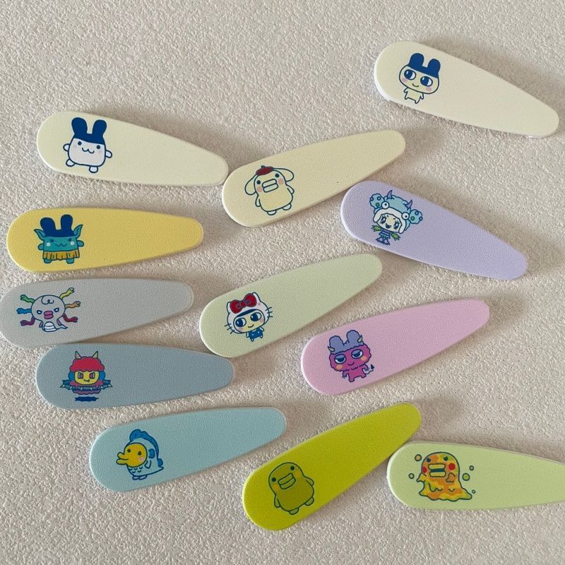 Tech Hair Accessories - Urocze kreskówkowe Tamagotchi, elektroniczne zwierzaki, ozdobne