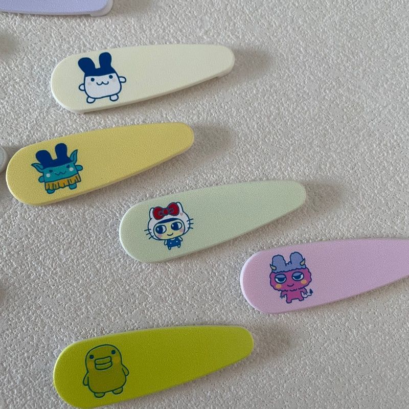 Urocze kreskówkowe Tamagotchi, – Tech Hair Accessories recenzja i cena